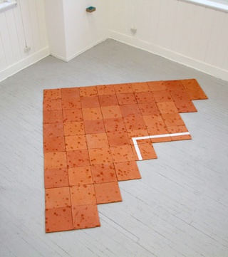 ___'Court'___, 52 fired terracotta tiles with ball impact crater marks and white glaze, 2014